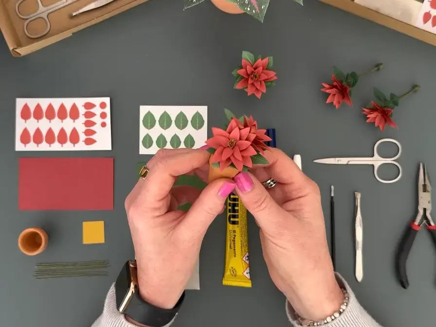 Finished paper Poinsettia in a terracotta pot