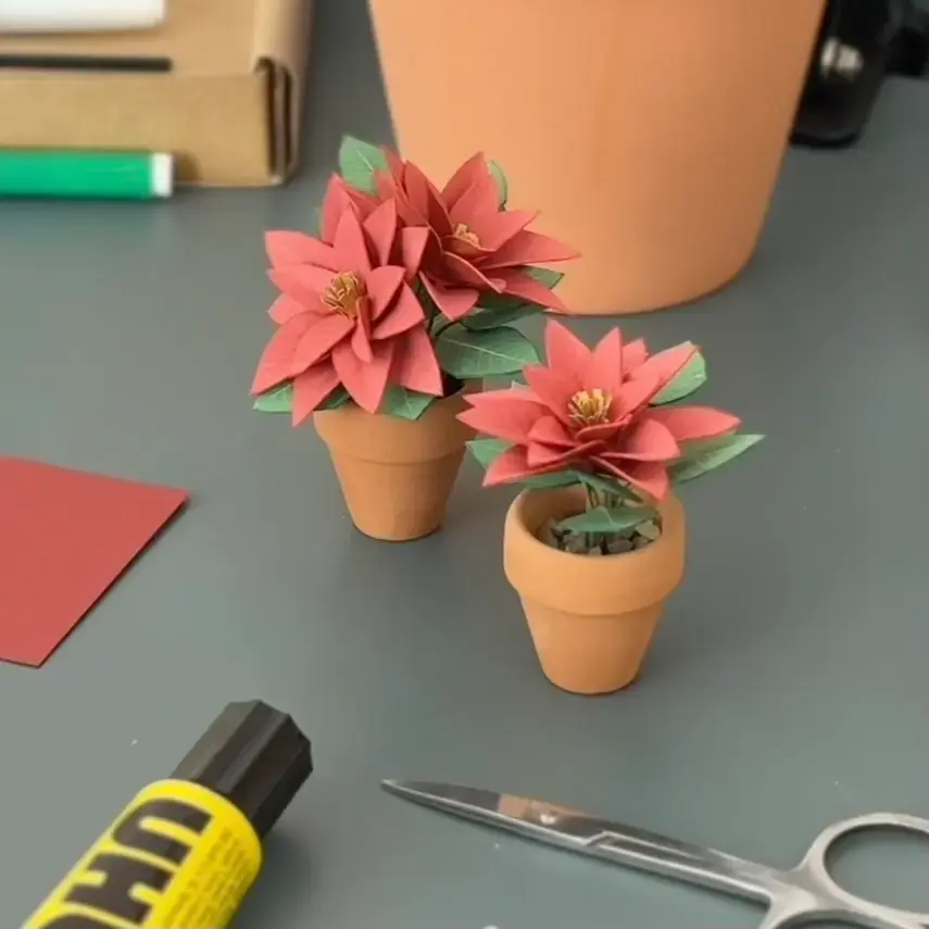 Crafting a paper Poinsettia by hand